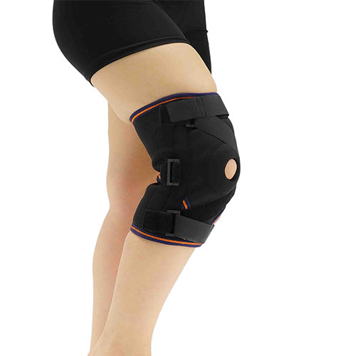 LIGAMENT AND PATELLA SUPPORTED CROSS BANDED KNEE SUPPORT